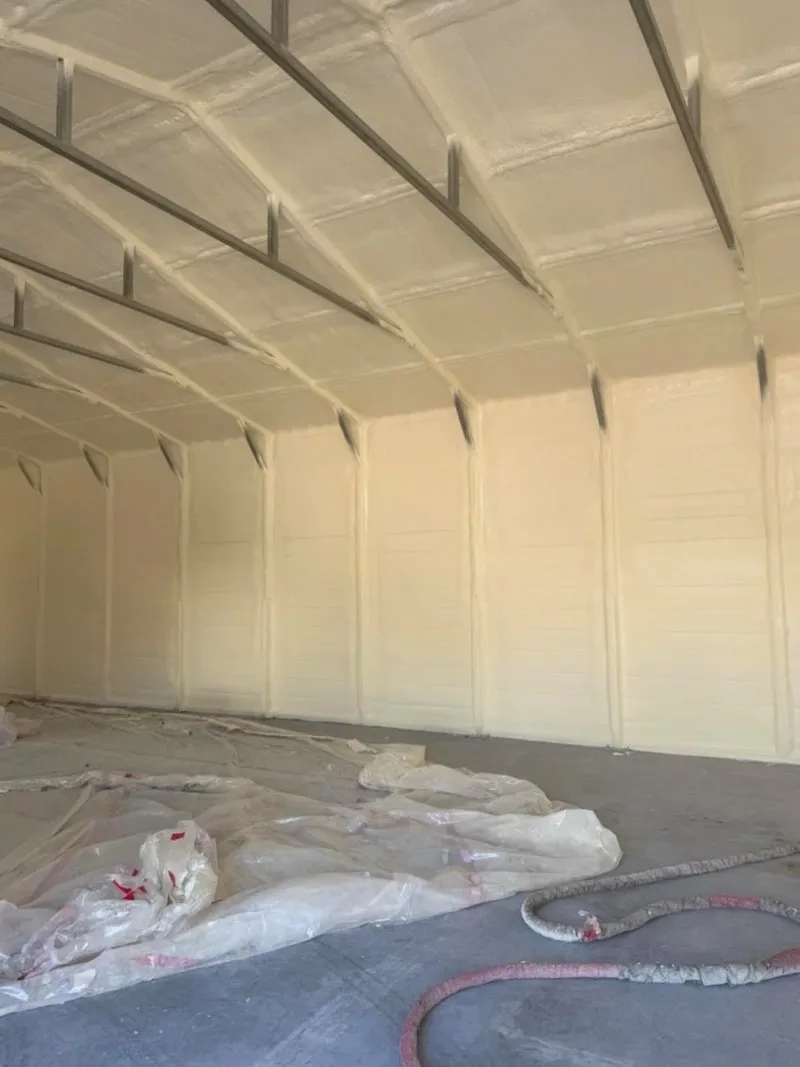 Spray foam insulation applied to a large pole barn interior in northwestern Wisconsin